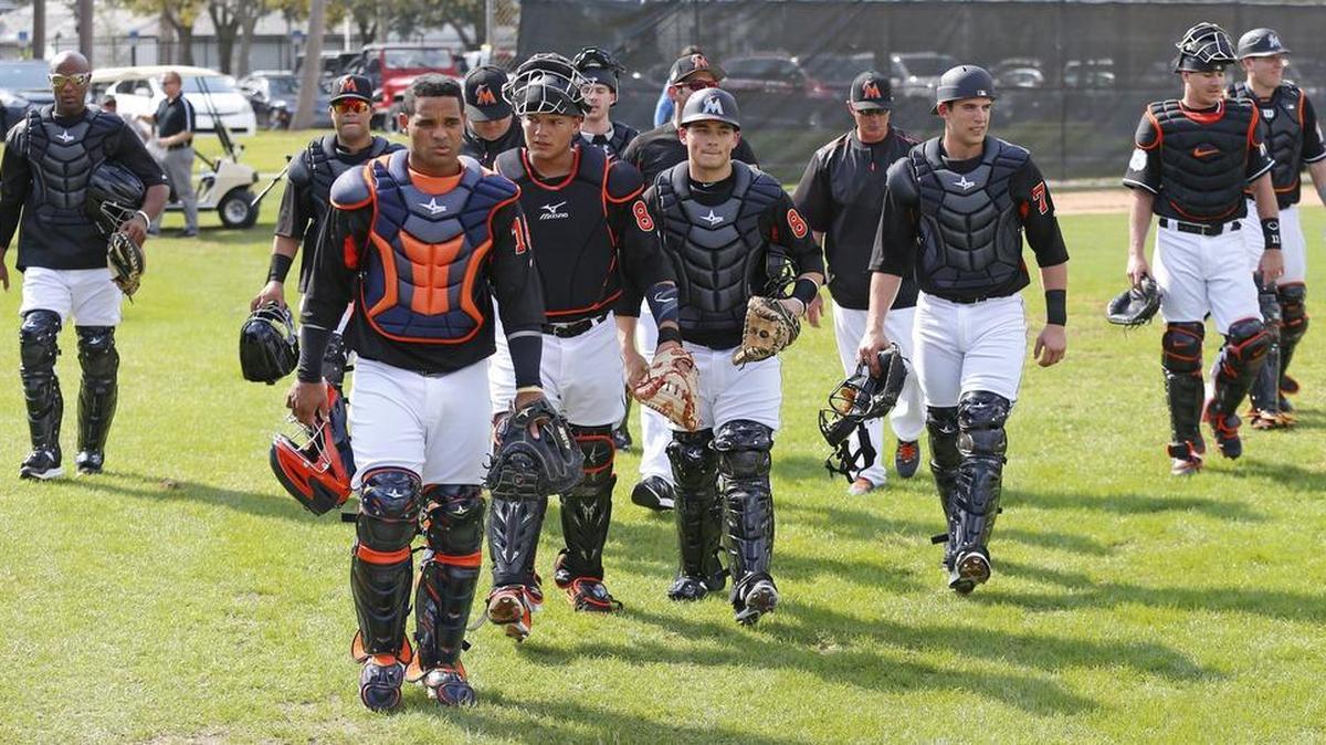 Catchers report as the Miami Marlins spring training gets underway at Roger Dean Stadium in Jupiter on Tuesday, Feb. 14, 2017.