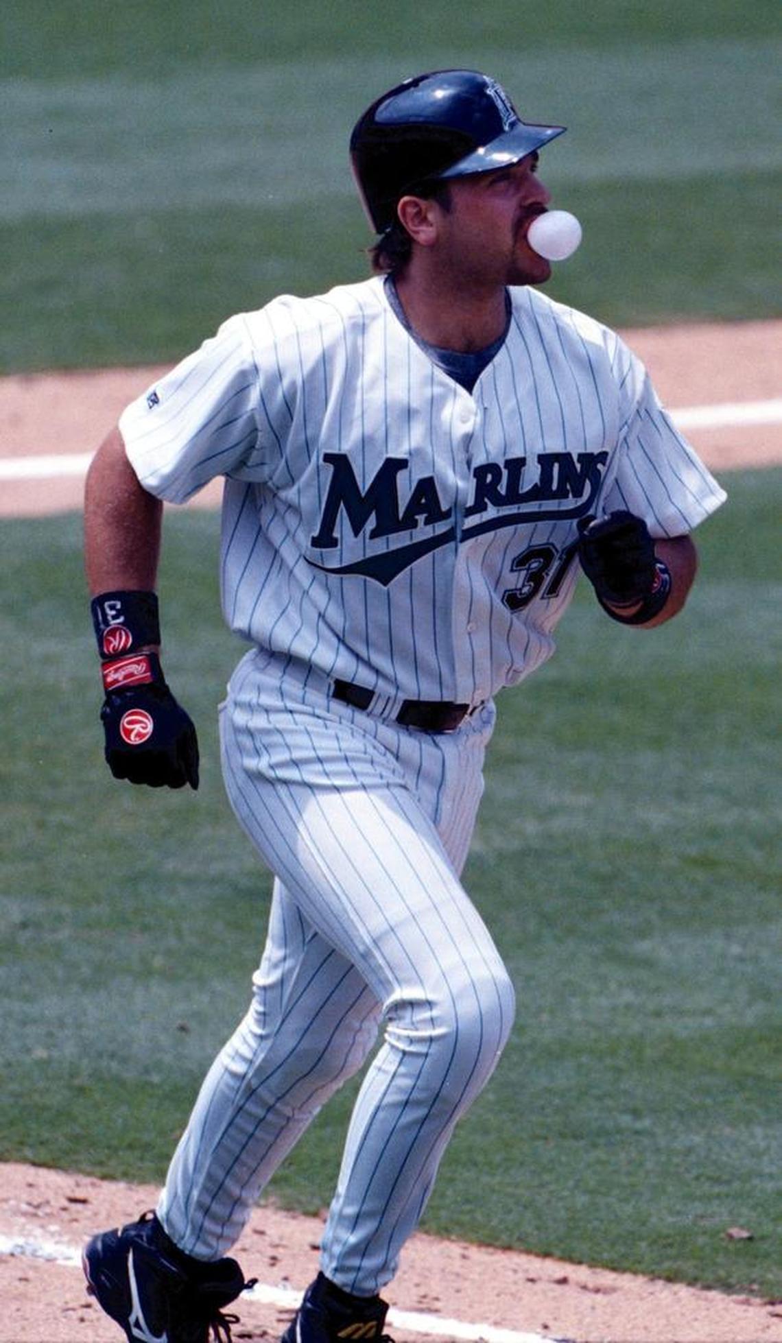 Florida catcher Mike Piazza blows a bubble after popping up in one of his 19 plate appearances with the Marlins in 1998.