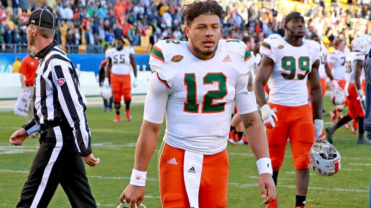 Miami Hurricanes quarterback Malik Rosier (12) walks off the field after being defeated by Pitt Panthers at Heinz Field on Friday.