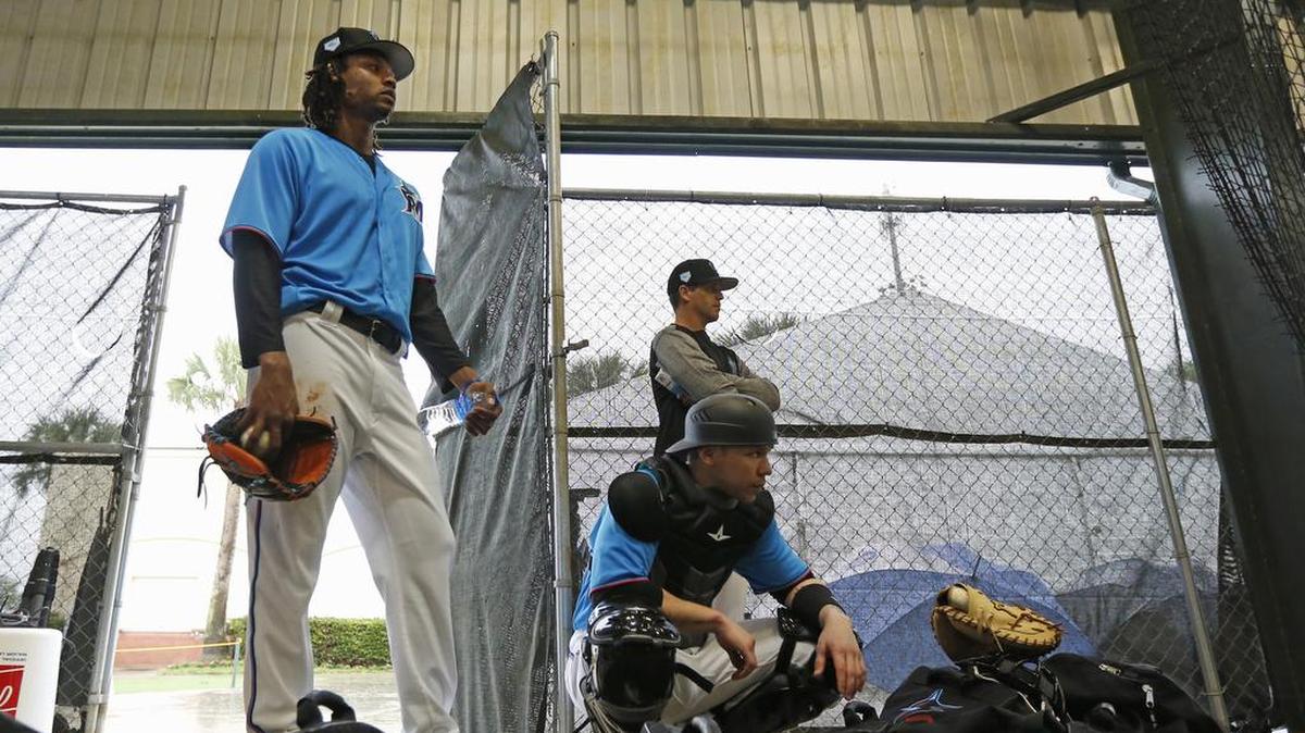 Miami Marlins pitcher Jose Urena and catcher B.J. Lopez during the spring training baseball workouts for pitchers and catchers at Roger Dean Stadium on Wednesday, February 13, 2019 in Jupiter, FL.