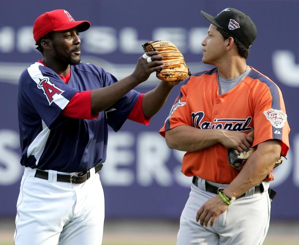 Los Angeles Angels outfielder Vladimir Guerrero hams it up with Florida Marlins outfielder Miguel Cabrera before the start of the 2005 Home Run Derby in Detroit.