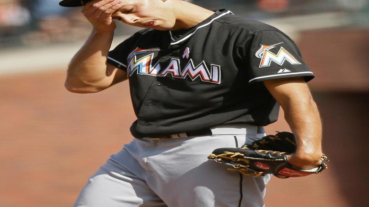 
Miami Marlins relief pitcher Steve Cishek reacts after walking the San Francisco Giants' Nori Aoki with the bases loaded in the ninth inning to tie their baseball game Sunday, May 10, 2015, in San Francisco. San Francisco won the game 3-2. 
