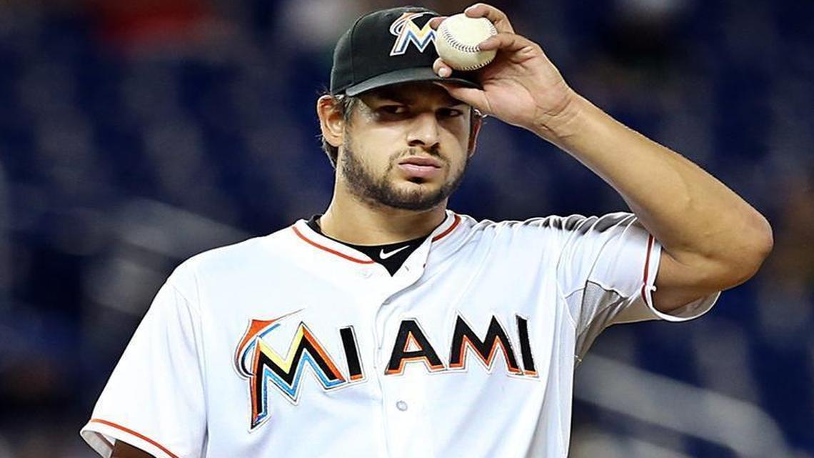 
Marlins starting pitcher Brad Hand reacts after loading the bases in the first inning against the New York Mets at Marlins Park on Tuesday, Aug. 4, 2015.
