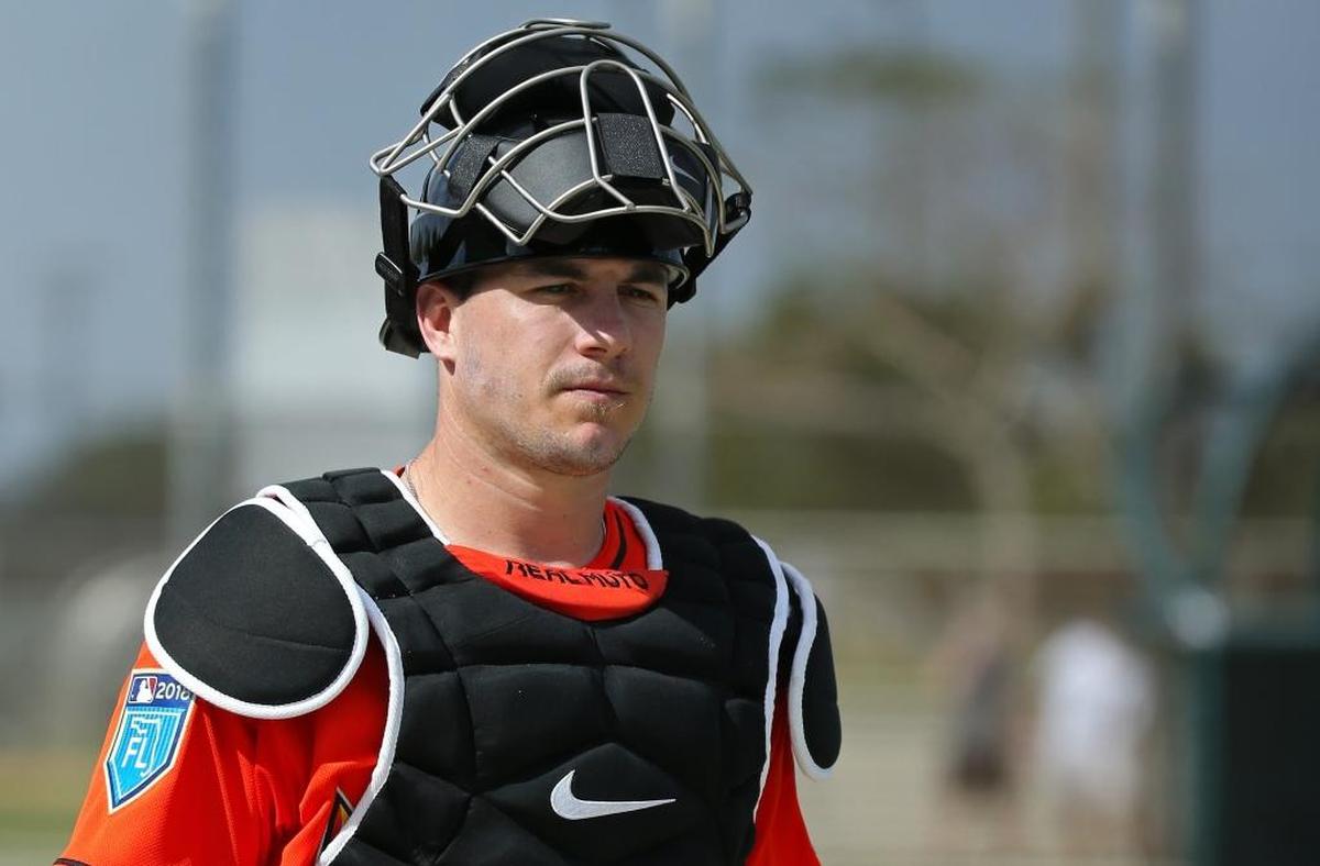 Miami Marlins catcher J.T. Realmuto looks on during the spring training baseball workouts for pitchers and catchers at Roger Dean Stadium on Wed., Feb. 14, 2018 in Jupiter, FL.