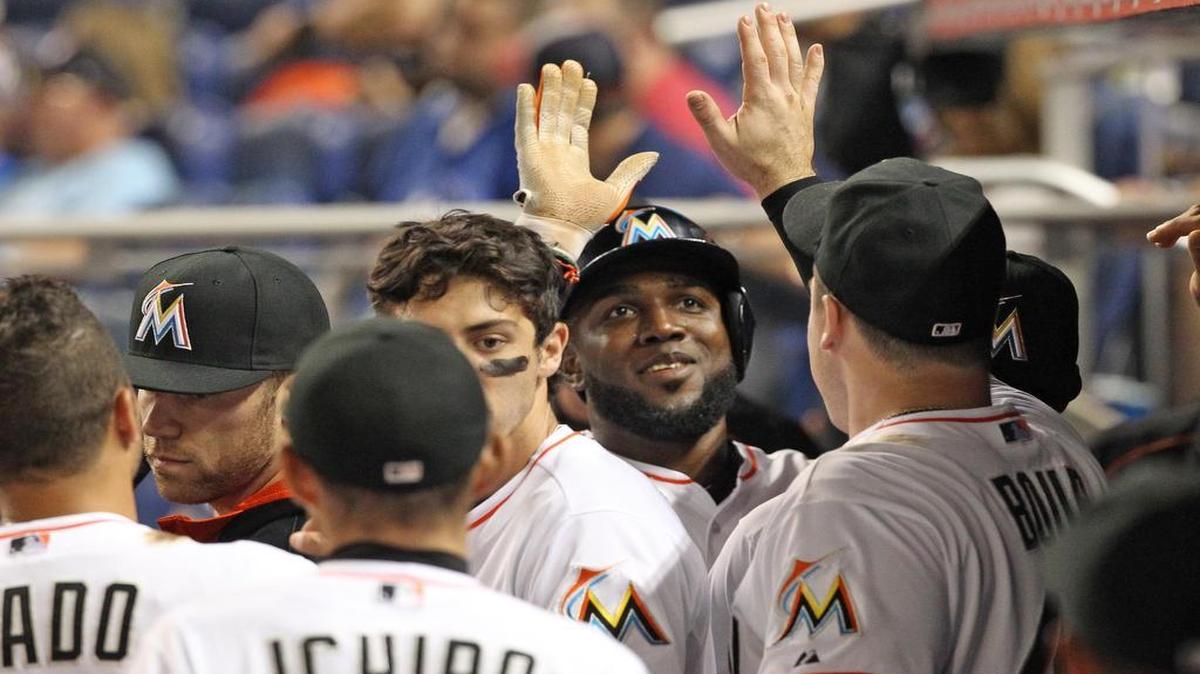 
Brad Hand pitched six innings, allowing six hits and two runs, and Marcell Ozuna hit a three-run double to rally the Marlins.

