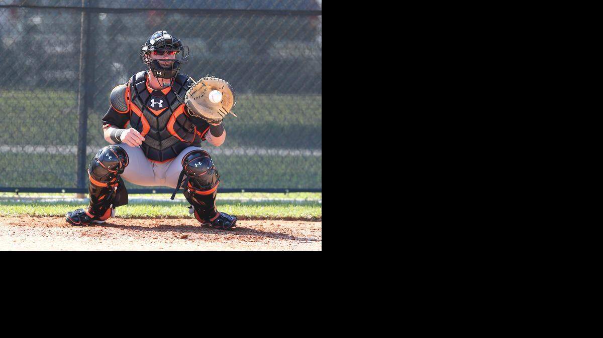 
Miami Marlins catcher Jarrod Saltalamacchia is shown at practice as pitchers and catchers report for spring training Friday, Feb. 20, 2015 at Roger Dean Stadium in Jupiter, Florida.
