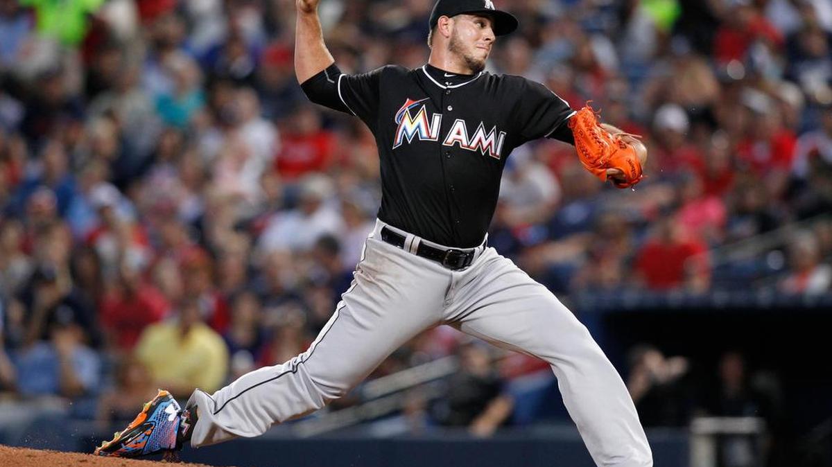 
Miami Marlins starting pitcher Jose Fernandez throws during the fourth inning of a baseball game against the Atlanta Braves, Friday, Aug. 7, 2015, in Atlanta.

