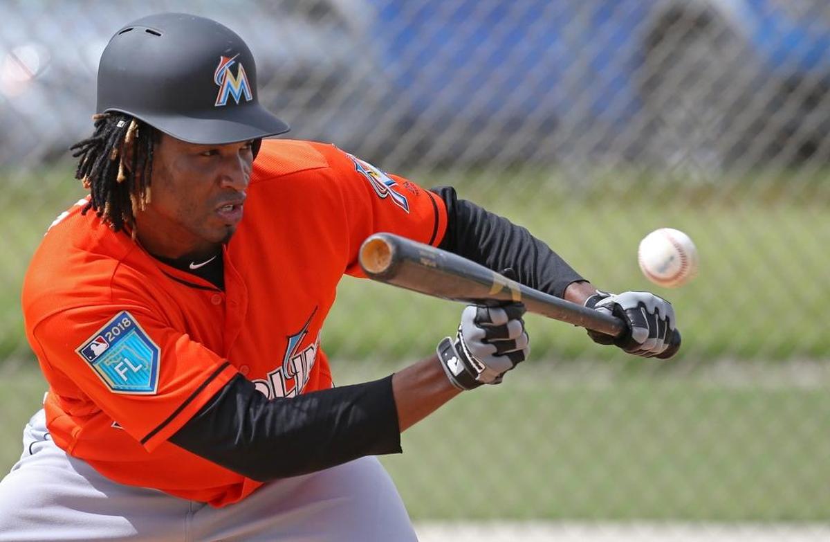 Miami Marlins pitcher Jose Urena bunts during batting practice at the spring training baseball workouts at Roger Dean Stadium on Tues., Feb. 20, 2018 in Jupiter, FL.