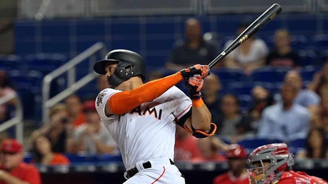 Marlins' right fielder Giancarlo Stanton hits a two runs home run (Dee Gordon on base), in the first inning of the Miami Marlins and Los Angeles Angels game at the Marlins Park in Little Havana in Miami on Fri., May 26, 2017.