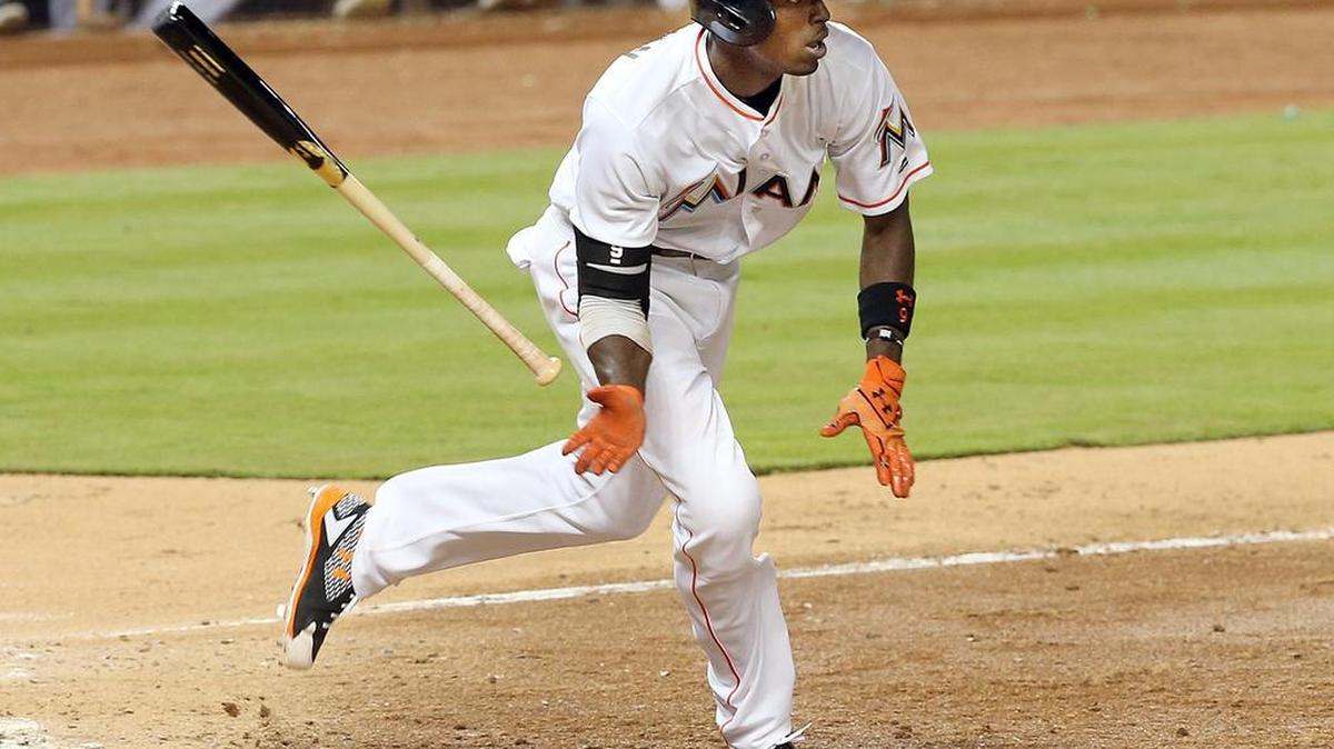 Dee Gordon (2B), of the Miami Marlins, hits a triple against the Detroit Tigers, during the sixth inning of the Marlins' home opener on Tues., April 5, 2016, at Marlins Park.
