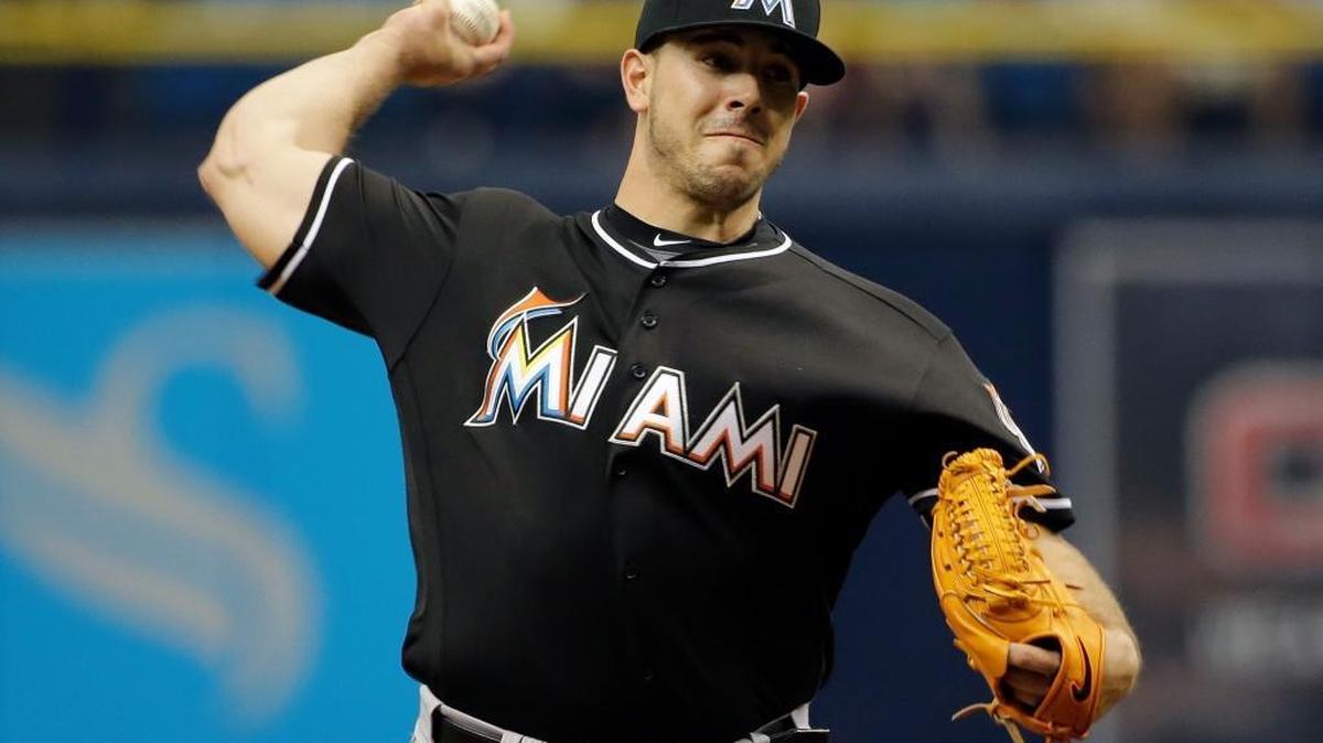Miami Marlins pitcher Jose Fernandez struck out 12 in seven innings en route to his first victory at Tropicana Field.