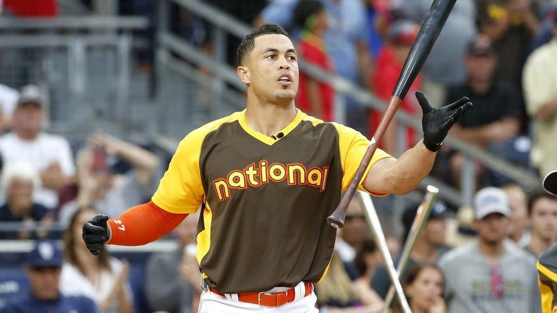 Giancarlo Stanton of the Miami Marlins flips his bat during the MLB baseball All-Star Home Run Derby on Monday.