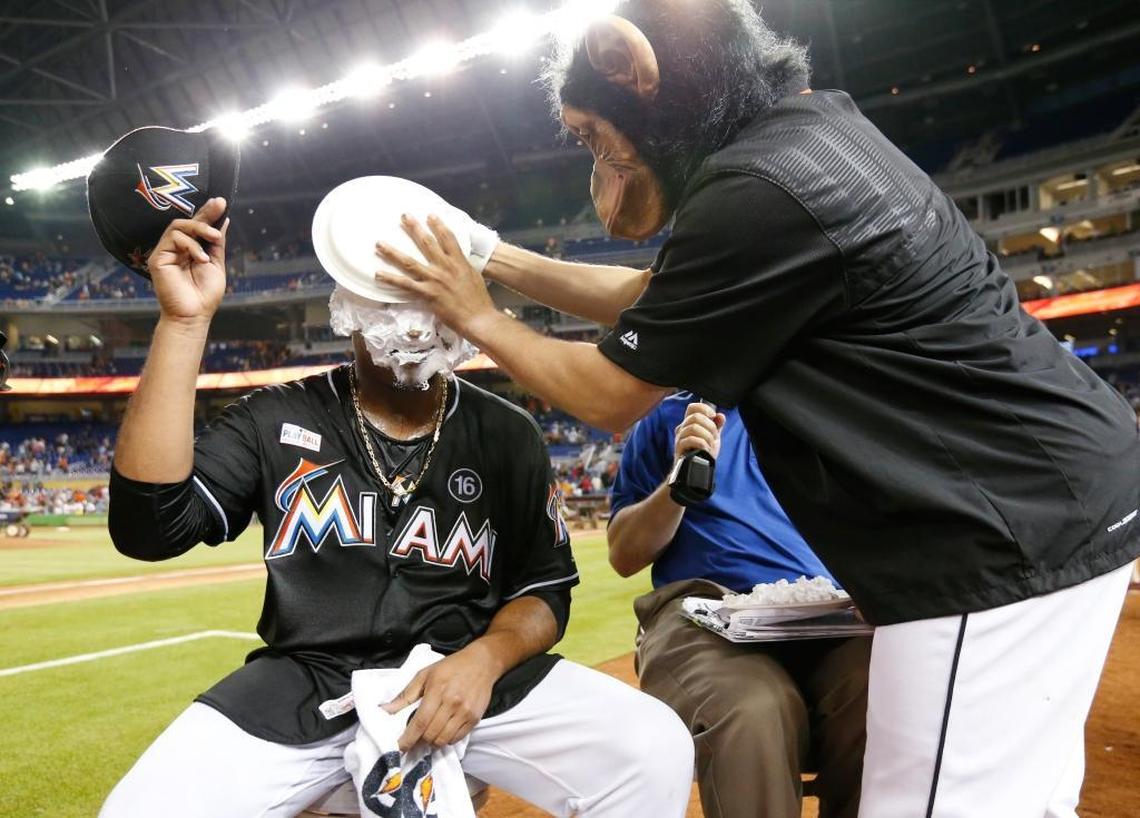 Wearing a monkey mask, Miami’s Miguel Rojas hits pitcher Edinson Volquez with a shaving cream pie after Volquez threw a no-hitter Saturday at Marlins Park.