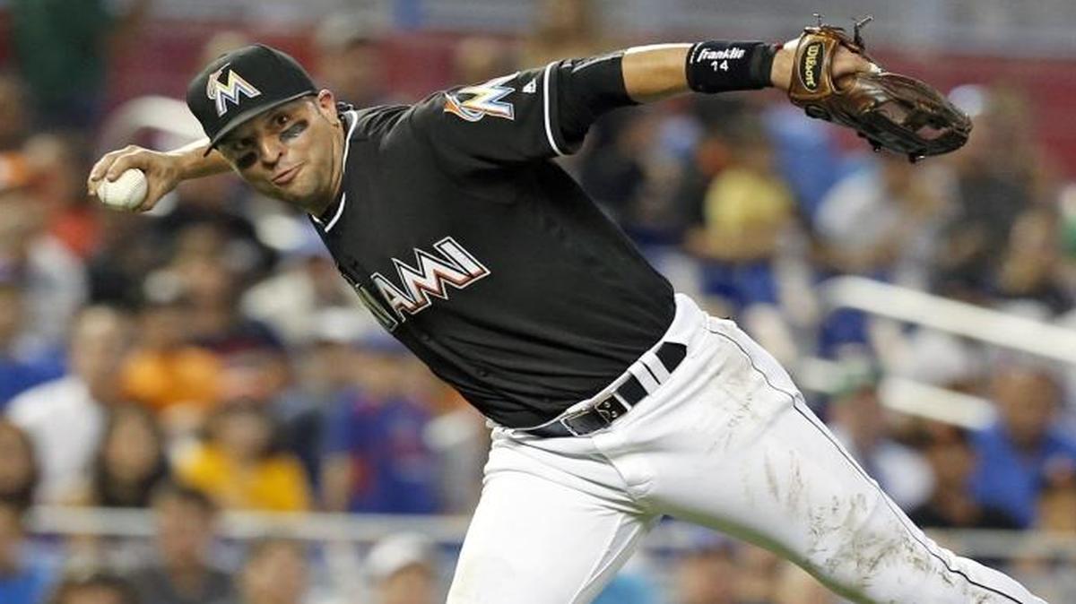 Miami Marlins third baseman Martin Prado throws to first to tag out Chicago Cubs left fielder Albert Almora Jr. in the fourth inning as the Miami Marlins host the Chicago Cubs at Marlins Park on Sat., June 25, 2016.