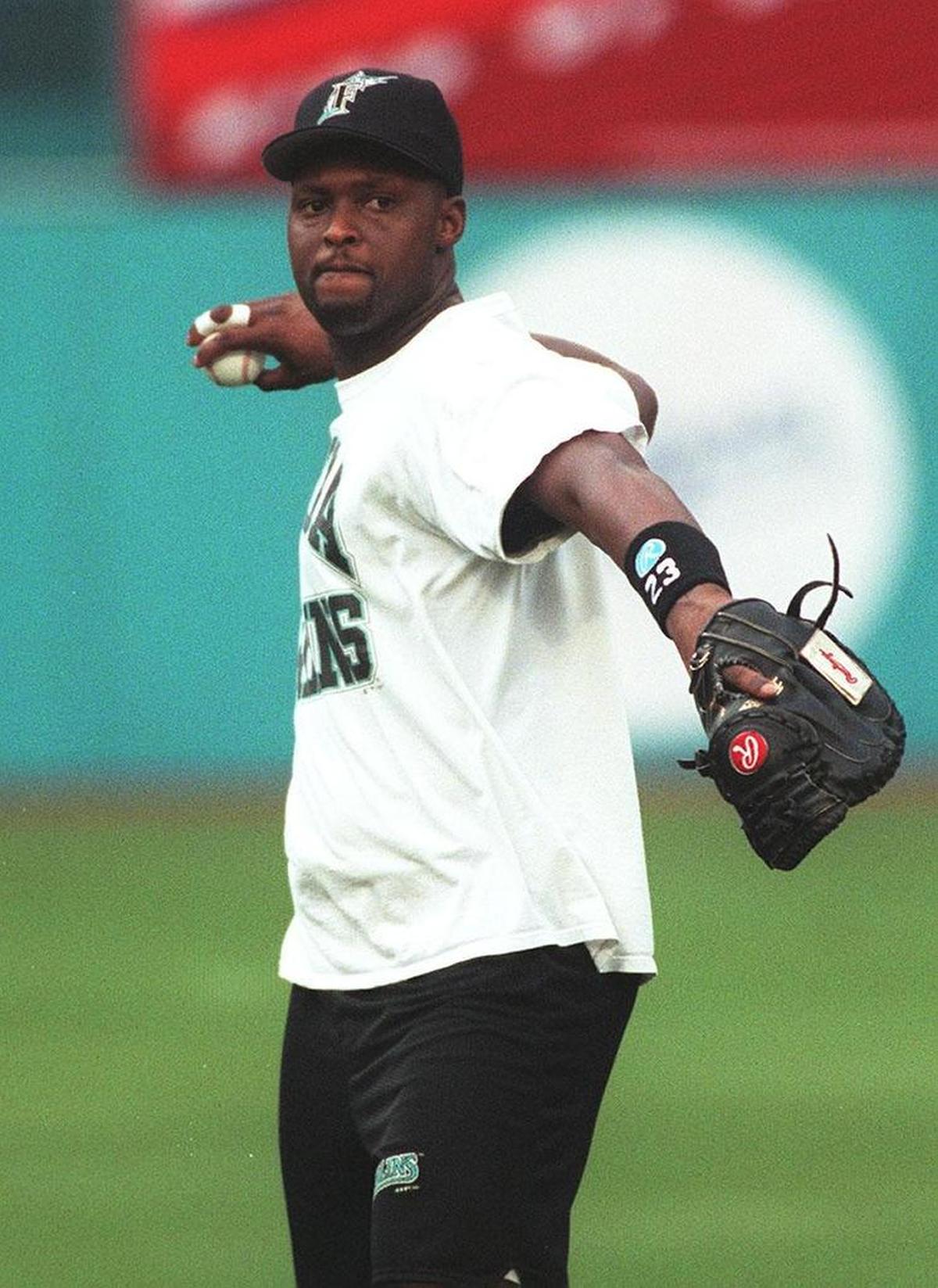 Florida Marlins catcher Charles Johnson warms up before a game at Pro Player Stadium on Sept. 12, 1997.