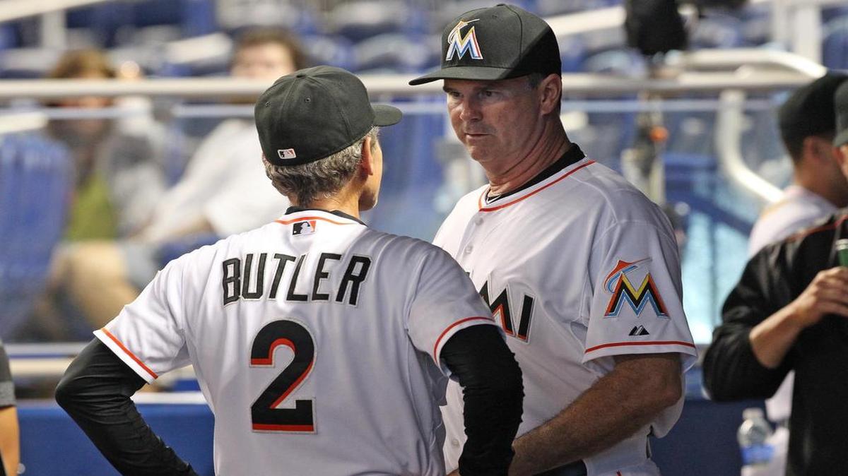 
Former Marlins third-base coach Brett Butler speaks with manager Dan Jennings on Monday, May 18, 2015.
