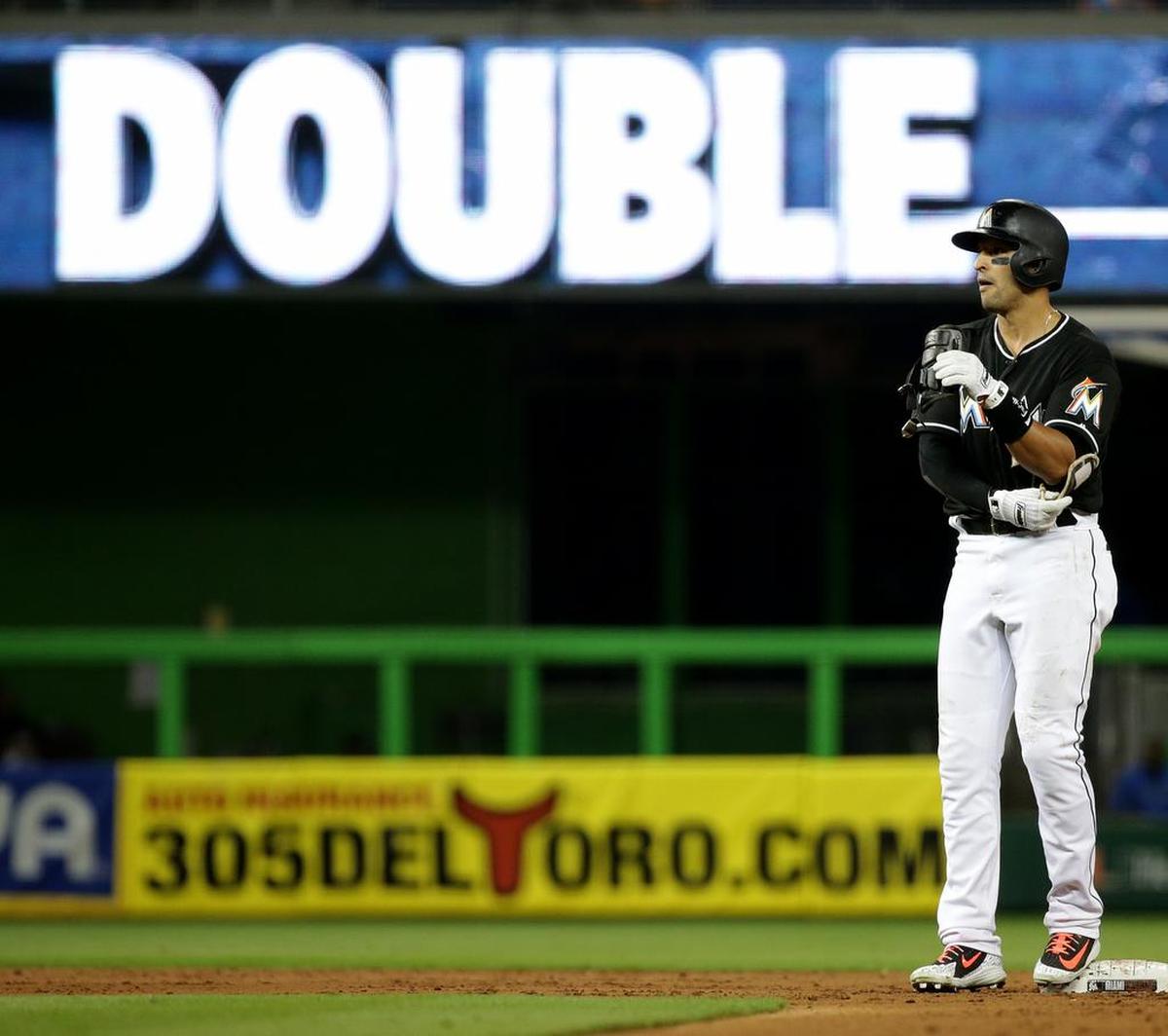 Marlins third baseman Martin Prado stands at second base after hitting a double in the third inning of the Miami Marlins vs Washington Nationals game at Marlins Park, Friday, May 25, 2018.