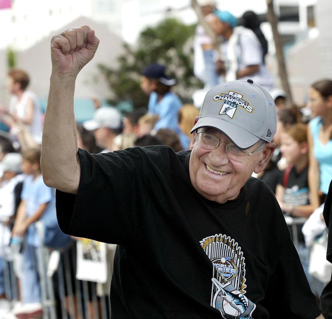 Legendary Spanish radio voice Rafael ‘Felo’ Ramirez rides along with the Marlins caravan in downtown Miami after the team won the 2003 World Series