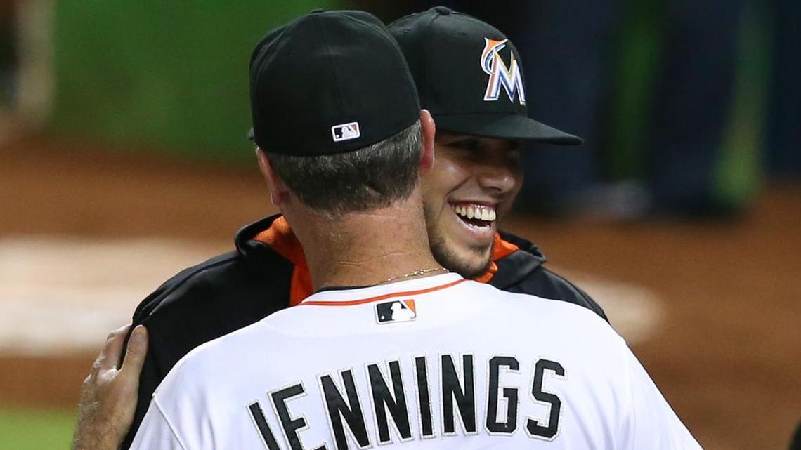 
Miami Marlins pitcher Jose Fernandez hugs manager Dan Jennings after defeating the Atlanta Braves 12-11 on Friday, Sept. 25, 2015 at Marlins Park in Miami. Fernandez became the first pitcher in the modern era to win his first 17 career home decisions.
