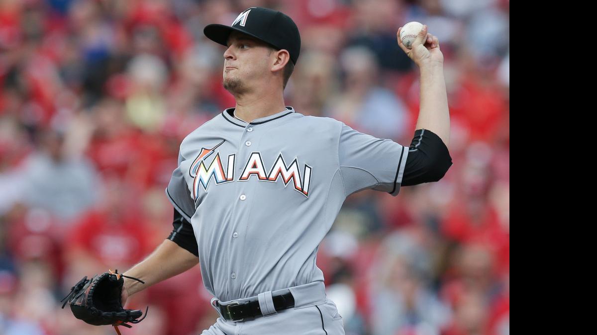 
Miami Marlins starting pitcher Justin Nicolino throws in the second inning against the Cincinnati Reds, Saturday, June 20, 2015, in Cincinnati. The Marlins won 5-0.
