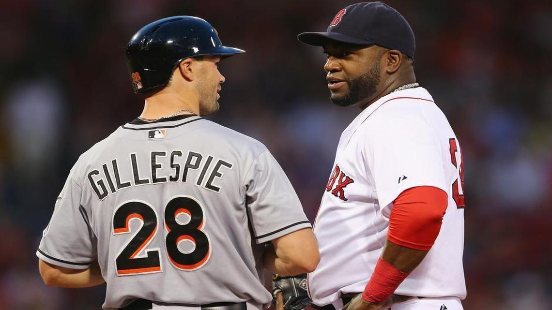 
David Ortiz #34 of the Boston Red Sox talks with Cole Gillespie #28 of the Miami Marlins on first during the fourth inning at Fenway Park on July 8, 2015 in Boston, Massachusetts.
