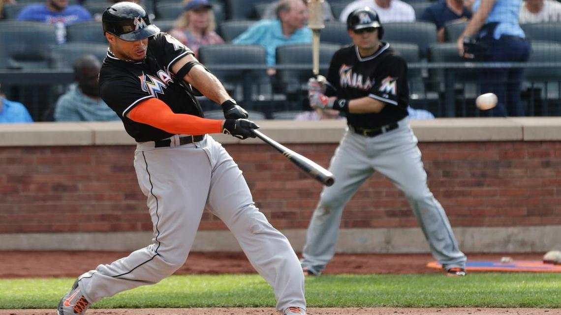 
Miami Marlins' Giancarlo Stanton hits a home run during the third inning of a baseball game against the New York Mets, Saturday, May 30, 2015, in New York.
