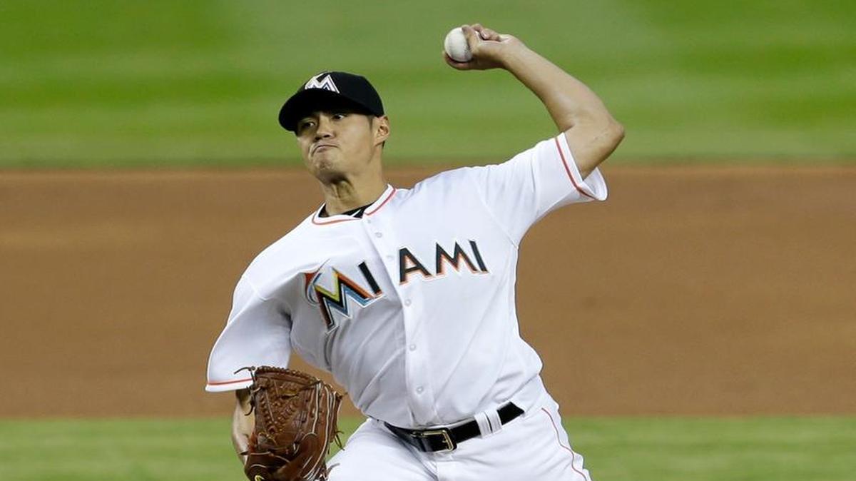 Miami Marlins' Wei-Yin Chen (54) pitches against the Detroit Tigers in the first inning of an interleague baseball game, Tuesday, April 5, 2016, in Miami.