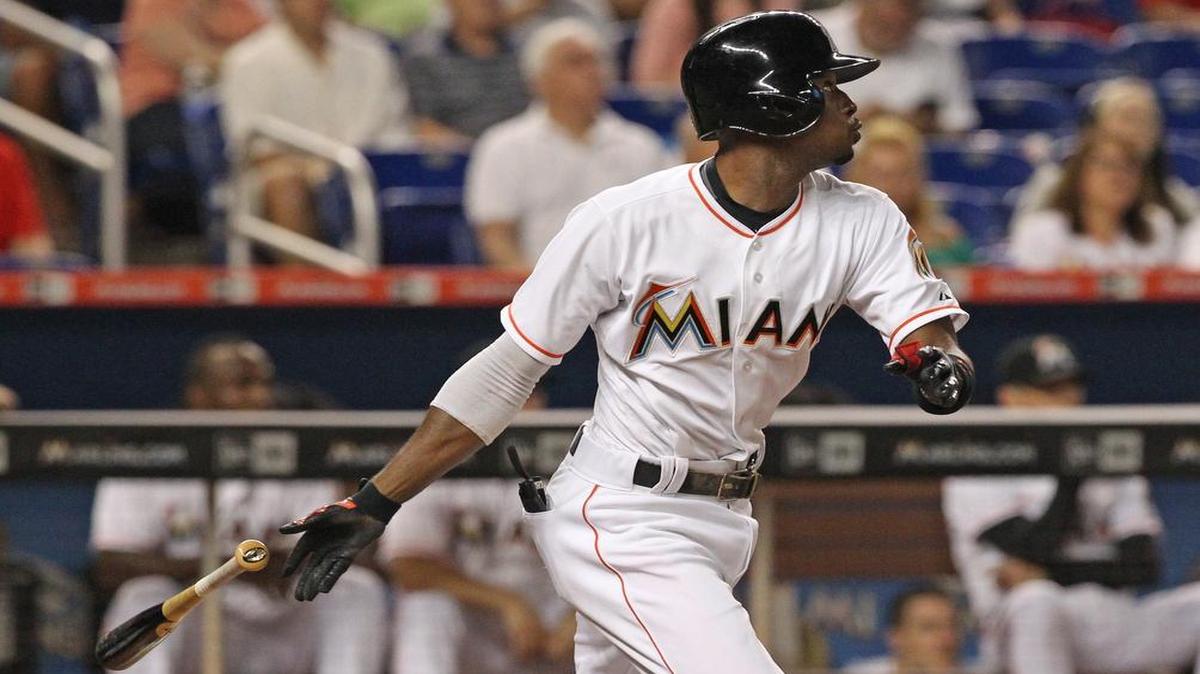 
Dee Gordon bats in the first inning. Gordon, vying for the NL batting crown, was 0 for 4. 
