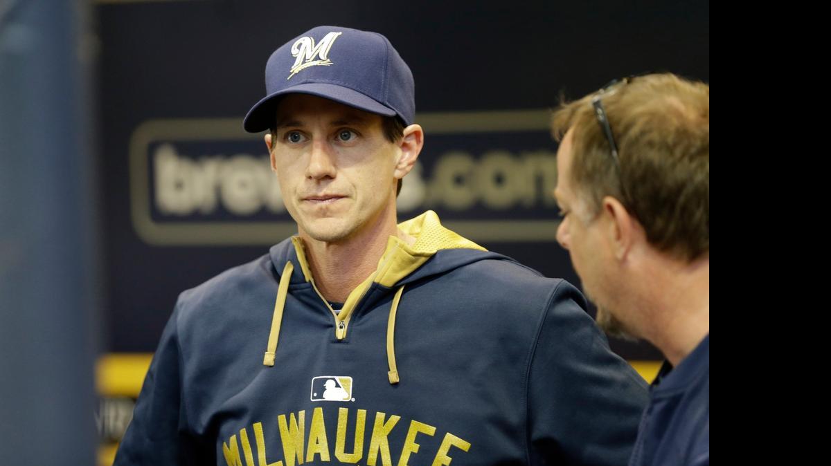 
New manager Craig Counsel #30 of the Milwaukee Brewers looks on from the dugout before the start of the game against the Los Angles Dodgers at Miller Park on May 05, 2015 in Milwaukee, Wisconsin.
