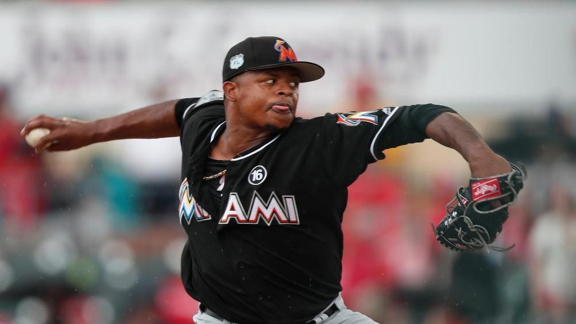 Miami Marlins pitcher Edinson Volquez works against the St. Louis Cardinals in a spring training baseball game Thursday, March 23, 2017, in Jupiter, Fla.