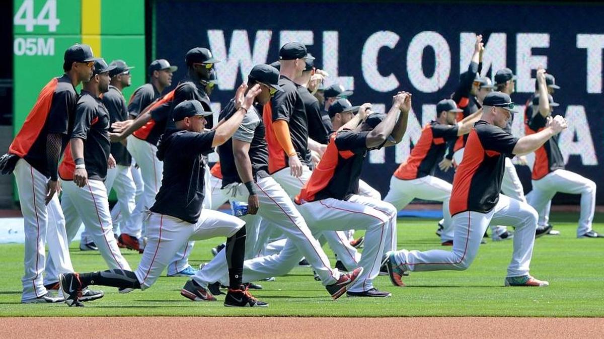 Miami Marlins warmup during a team stretch/workout a day before season opening's work out day at Marlins Park on Wed., March 28, 2018.