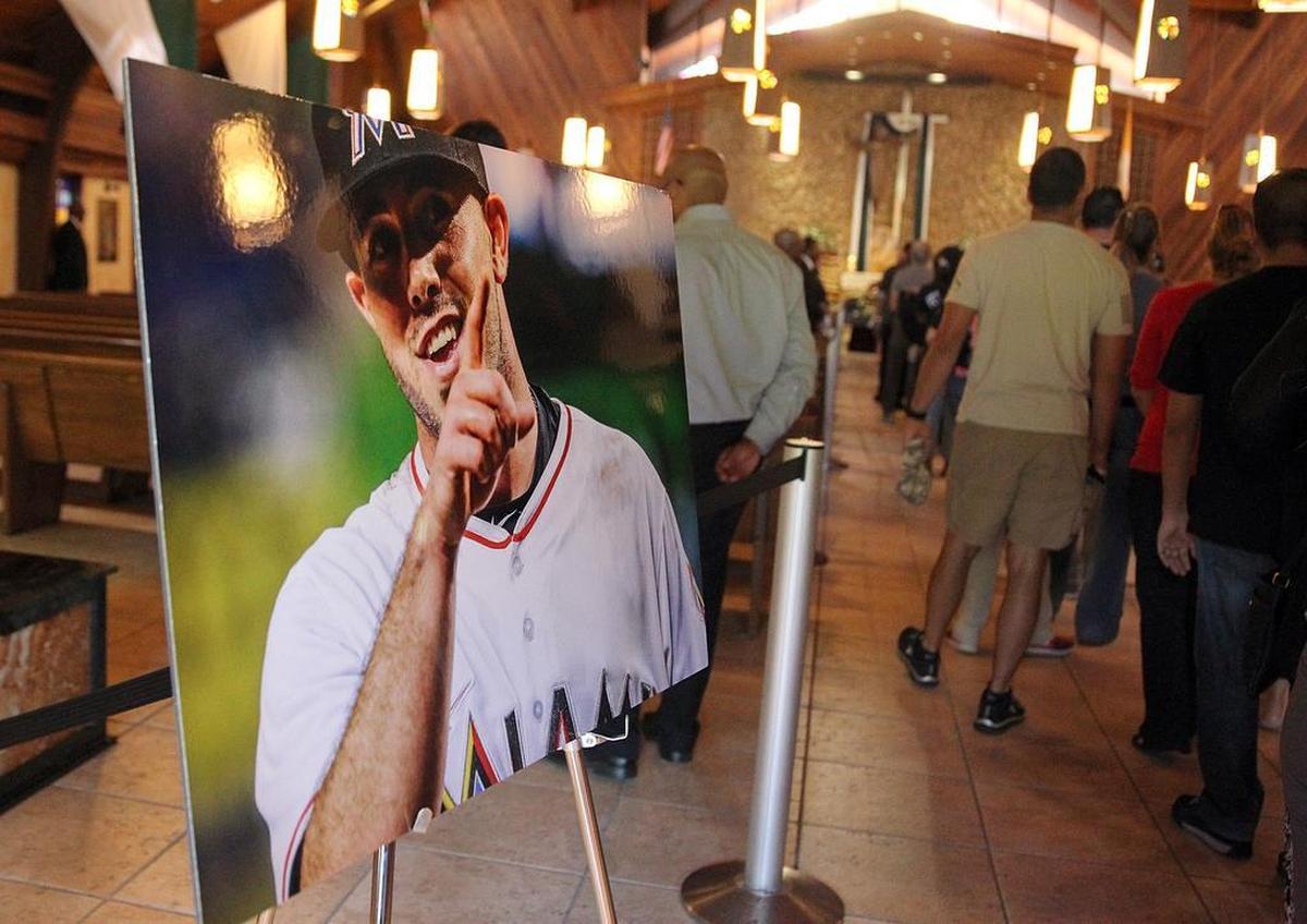 Fans and community members line up to pay tribute to their idol Miami Marlins’ Jose Fernandez, who died in a boating accident Sunday morning, during a public viewing at St. Brendan Catholic Church in Miami on Sept. 28, 2016.