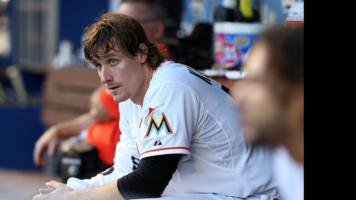 
Miami Marlins starting pitcher Tom Koehler looks on from the dugout during a 4-2 loss to the Arizona Diamondbacks at Marlins Park on Tuesday, May 19, 2015.
