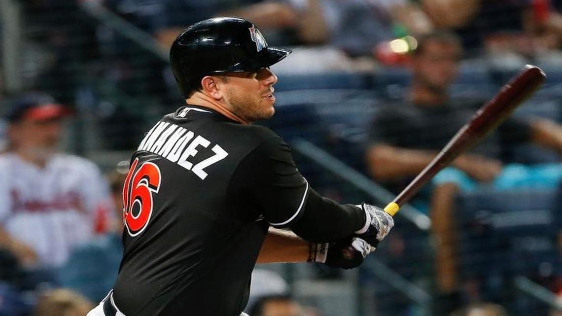Miami Marlins pinch hitter Jose Fernandez follows through with a game-winning two-run double in the 12th inning of a baseball game against the Atlanta Braves Fri., July 1, 2016, in Atlanta. Miami won 7-5.