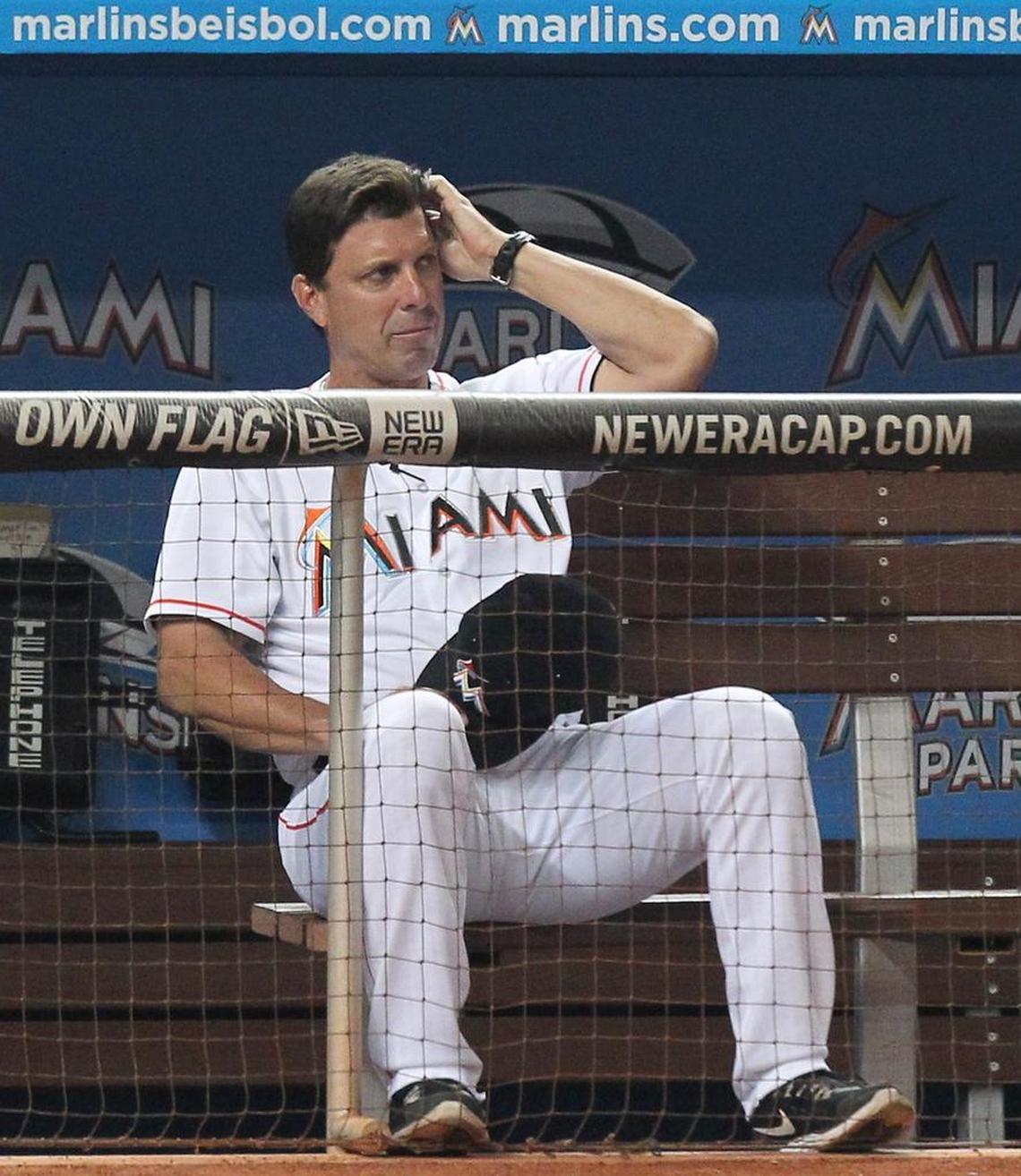 Miami Marlins hitting coach Tino Martinez watch from the dugout during the fifth inning of the Miami Marlins against the Philadelphia Phillies game at Marlins Park in Miami on Sat., April 13, 2013.