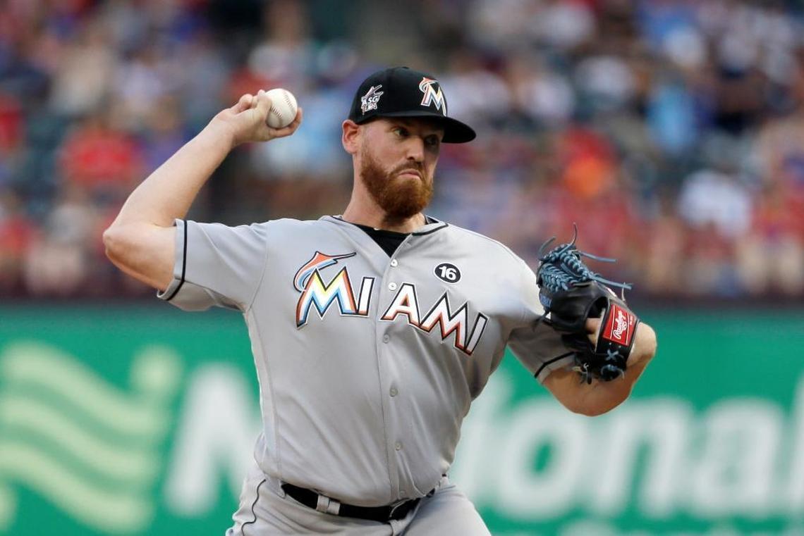 Miami Marlins' Dan Straily throws to the Texas Rangers during the first inning of a baseball game, Tues., July 25, 2017, in Arlington, Texas.