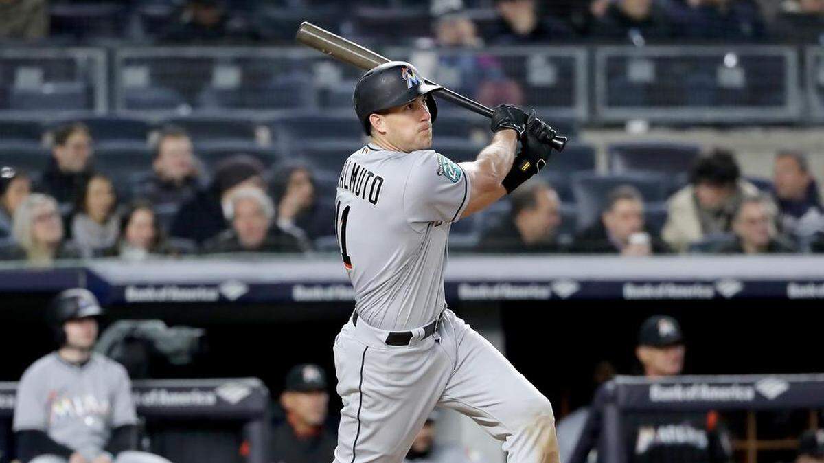 NEW YORK, NY - APRIL 17: J.T. Realmuto #11 of the Miami Marlins hits a three run home run in the fifth inning against the New York Yankees at Yankee Stadium on April 17, 2018 in the Bronx borough of New York City. (Photo by Elsa/Getty Images)