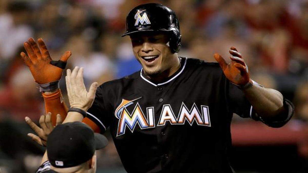 
Miami Marlins’ Giancarlo Stanton celebrates his home run against the Los Angeles Angels in Anaheim, Calif., Monday, Aug. 25, 2014. 
