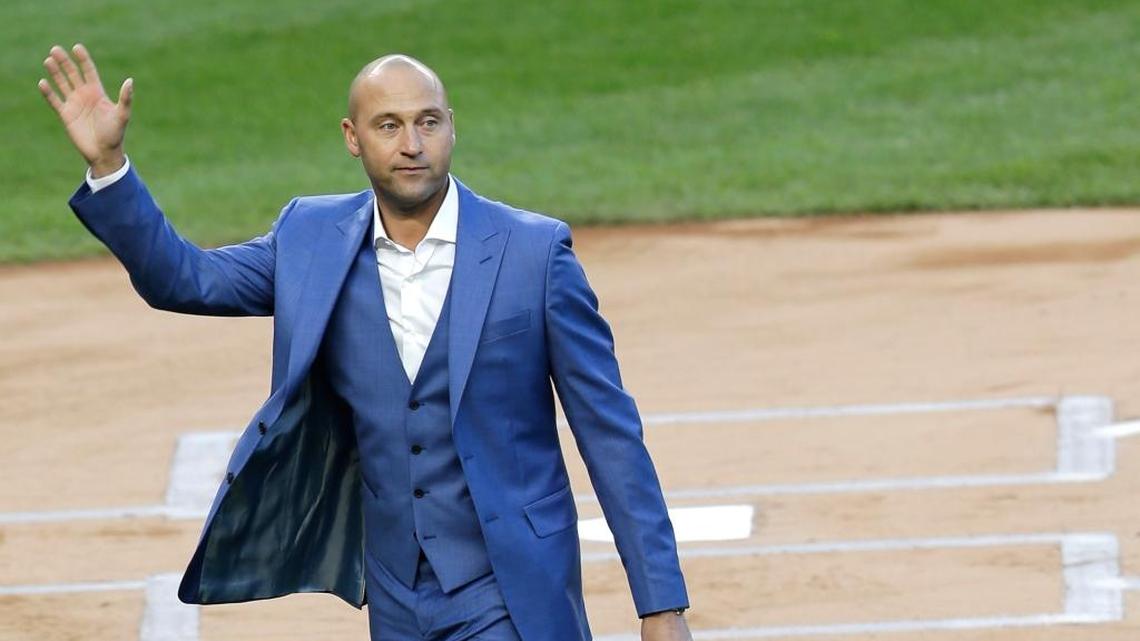 Former New York Yankee Derek Jeter waves to fans during a ceremony retiring his number at Yankee Stadium, Sunday, May 14, 2017, in New York.
