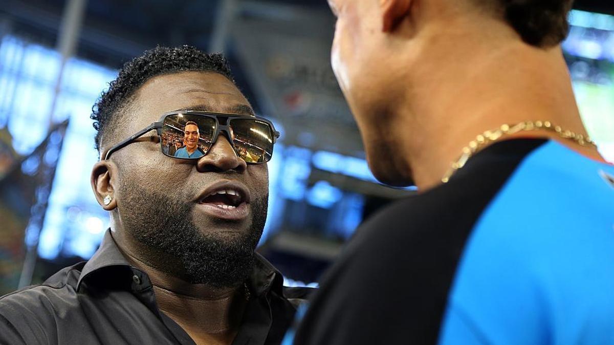 Davis Ortiz “Big Papi” (left), a retired Dominican American professional baseball player, talks with American League outfielder Aaron Judge before the MLB All-Star game between the National League and the American League on Tues., July 11, 2017, at Marlins Park in Miami.