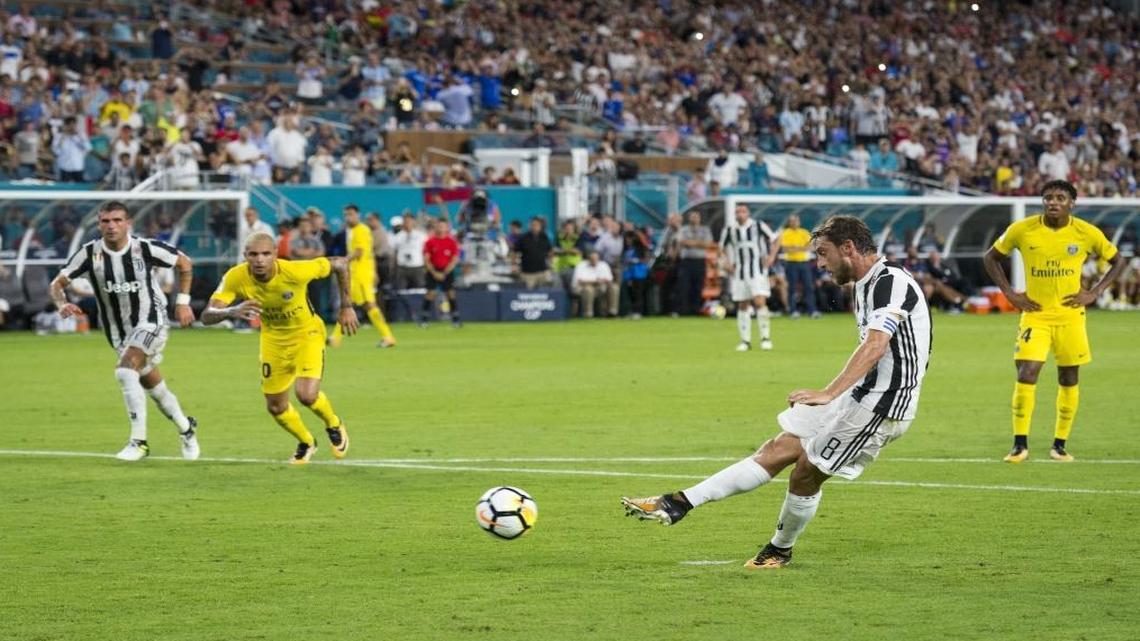 Juventus' Claudio Marchisio scores a goal on a penalty as Juventus plays PSG at Hard Rock Stadium on Wed., July 26, 2017.