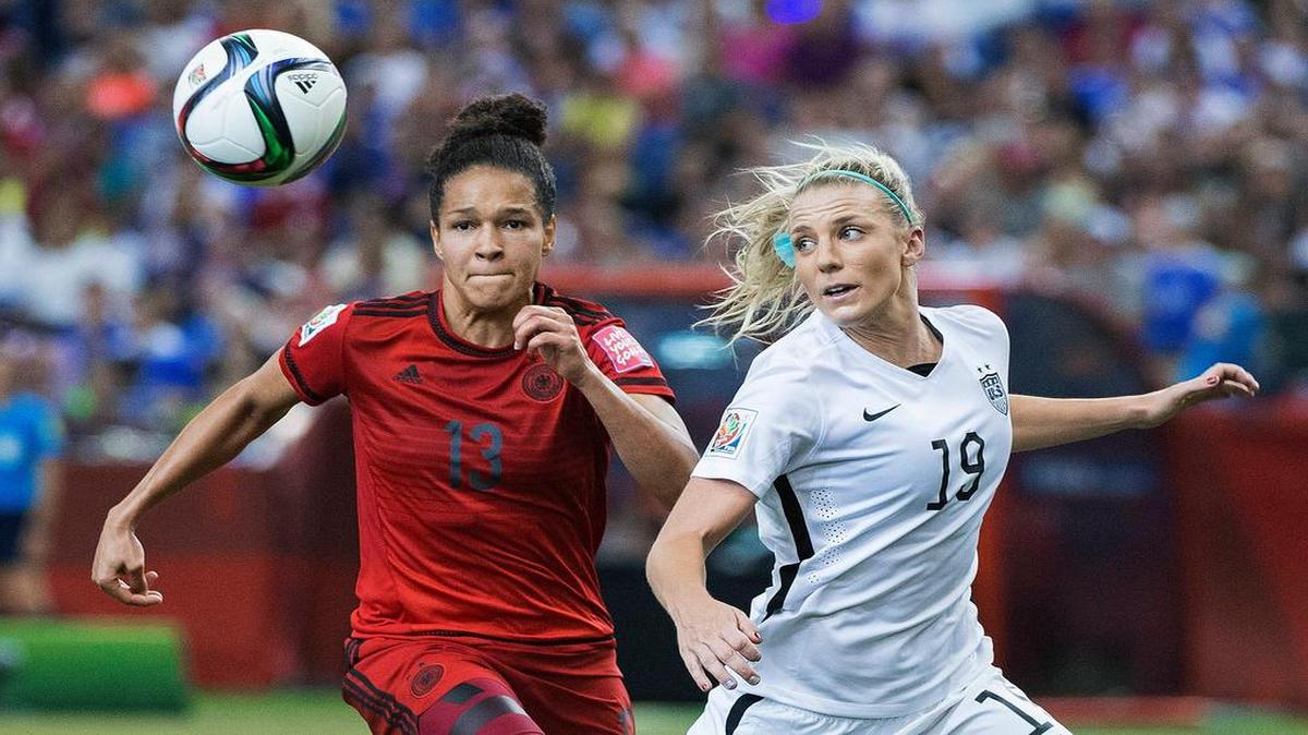 
Defensive stalwart: Julie Johnston, right, is a breakout star who made the U.S. roster only because of injuries to others. 

