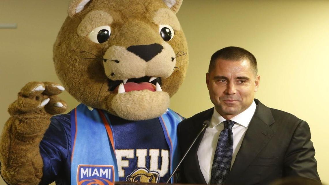 Riccardo Silva, owner of Miami FC, poses with the FIU mascot before a press conference at FIU Stadium on Wednesday, Oct. 28, 2015.