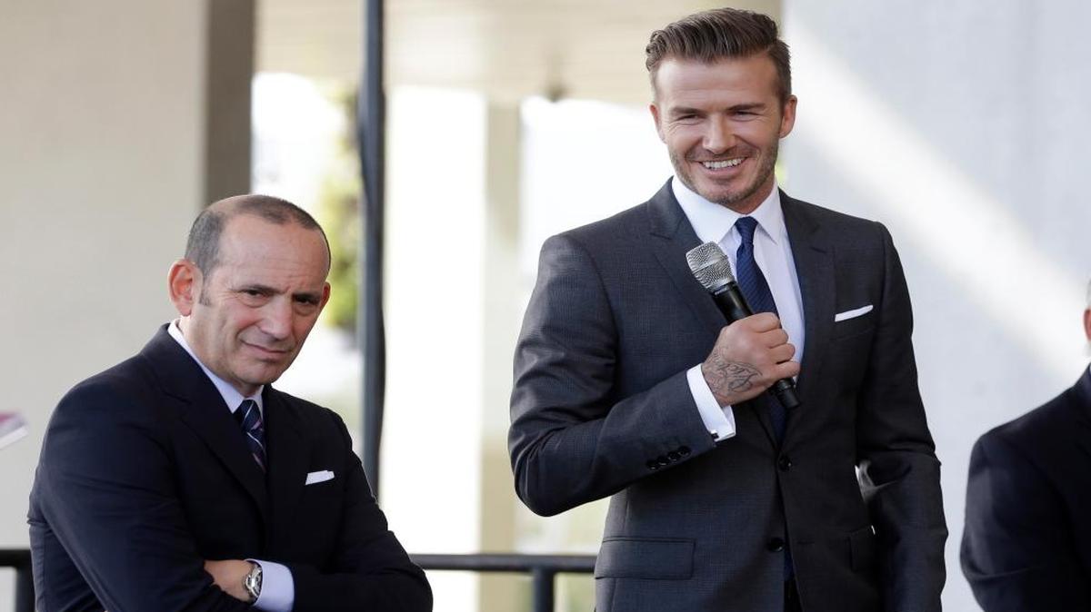 David Beckham, right, and Major League Soccer Commissioner Don Garber listen to a question at a news conference in Miami. That was three years ago, when Beckham wanted his MLS stadium at PortMiami. That bid failed, as did one for a stadium next to Marlins Park. Garber is expected to announce the league’s intentions toward Beckham’s plan for an Overtown stadium.