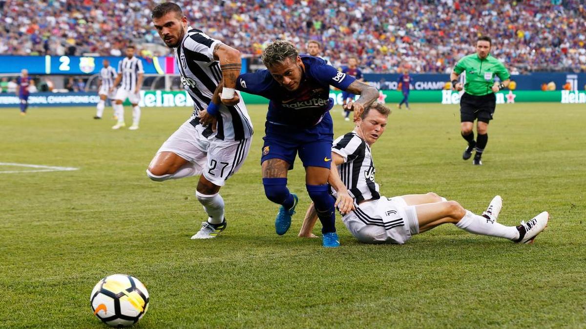 Barcelona’s Neymar, center, who scored two goals against Juventus on Saturday night in an International Champions Cup match in East Rutherford, New Jersey, has been rumored to be joining Paris Saint-Germain for a huge transfer fee.