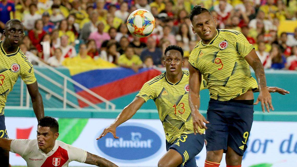 Forward Alfredo Morelo #9, of Colombia, hits a header for the only goal of the match , against Peru, during extra time at the end of the second half of a friendly match between Colombia and Peru at Hard Rock Stadium in Miami Gardens on Friday, November 15, 2019.