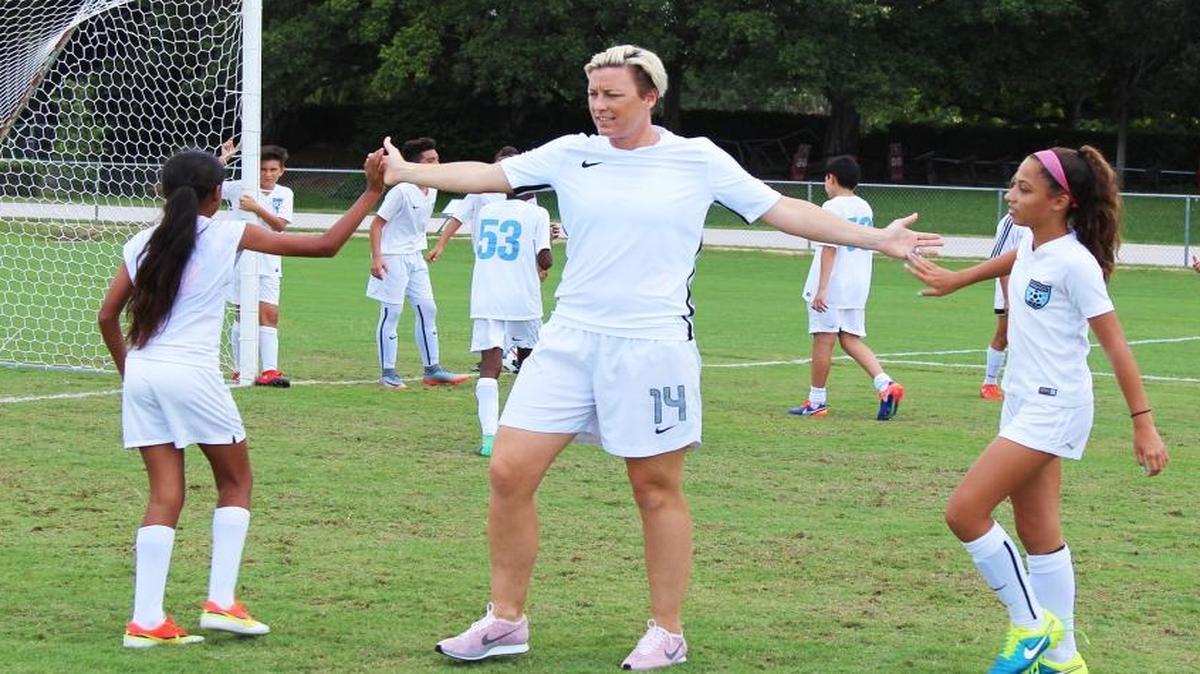 U.S. Ambassador Abby Wambach works with the two Weston soccer teams that advanced to the 2017 Danone Nations Cup.