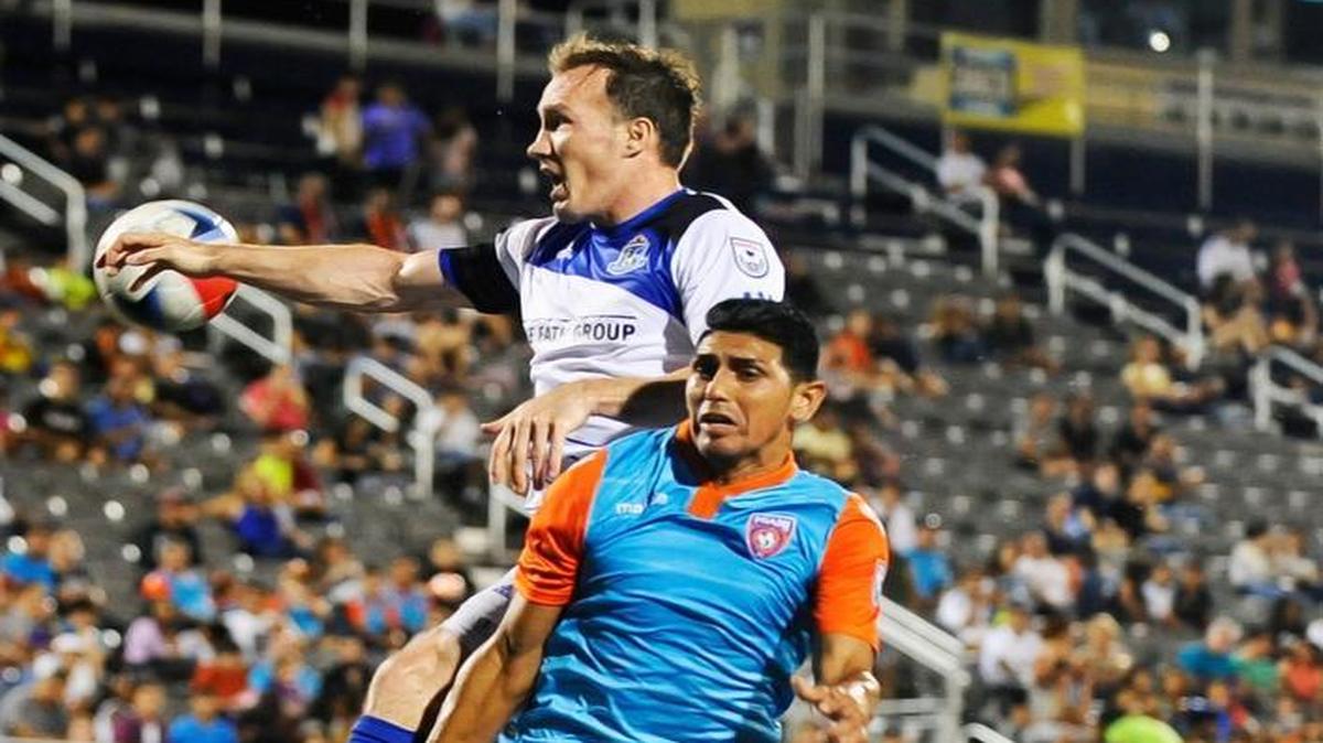 Miami FC forward Jaime Chavez (9) goes up for a header during their game against FC Edmonton in this May 28, 2016, file photo.