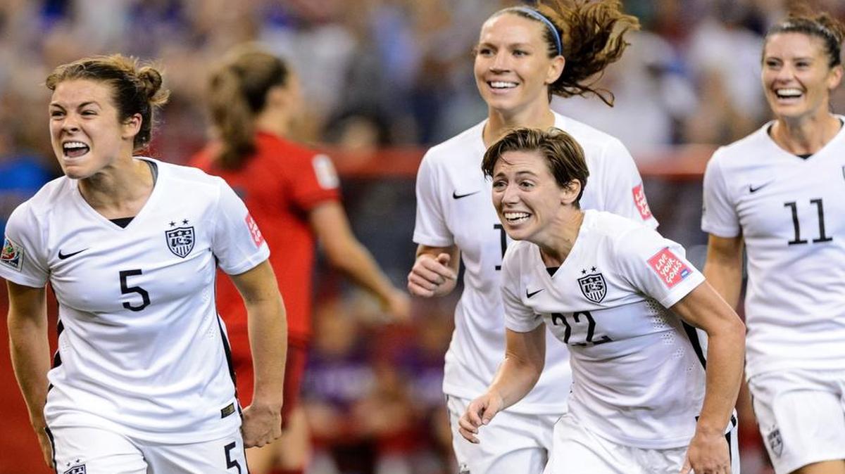 
Kelley O'Hara of the United States celebrates with teammates after scoring in the second half against Germany in the FIFA Women's World Cup at Olympic Stadium on June 30, 2015 in Montreal, Canada. 
