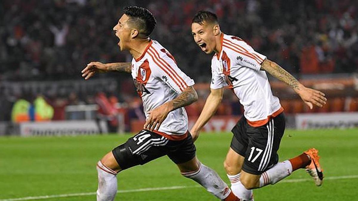 Ignacio Scocco, left, of Argentina’s River Plate celebrates after scoring against Bolivia’s Wilstermann club, with teammate Carlos Auzqui during a Copa Libertadores soccer match in Buenos Aires on Sept. 21.